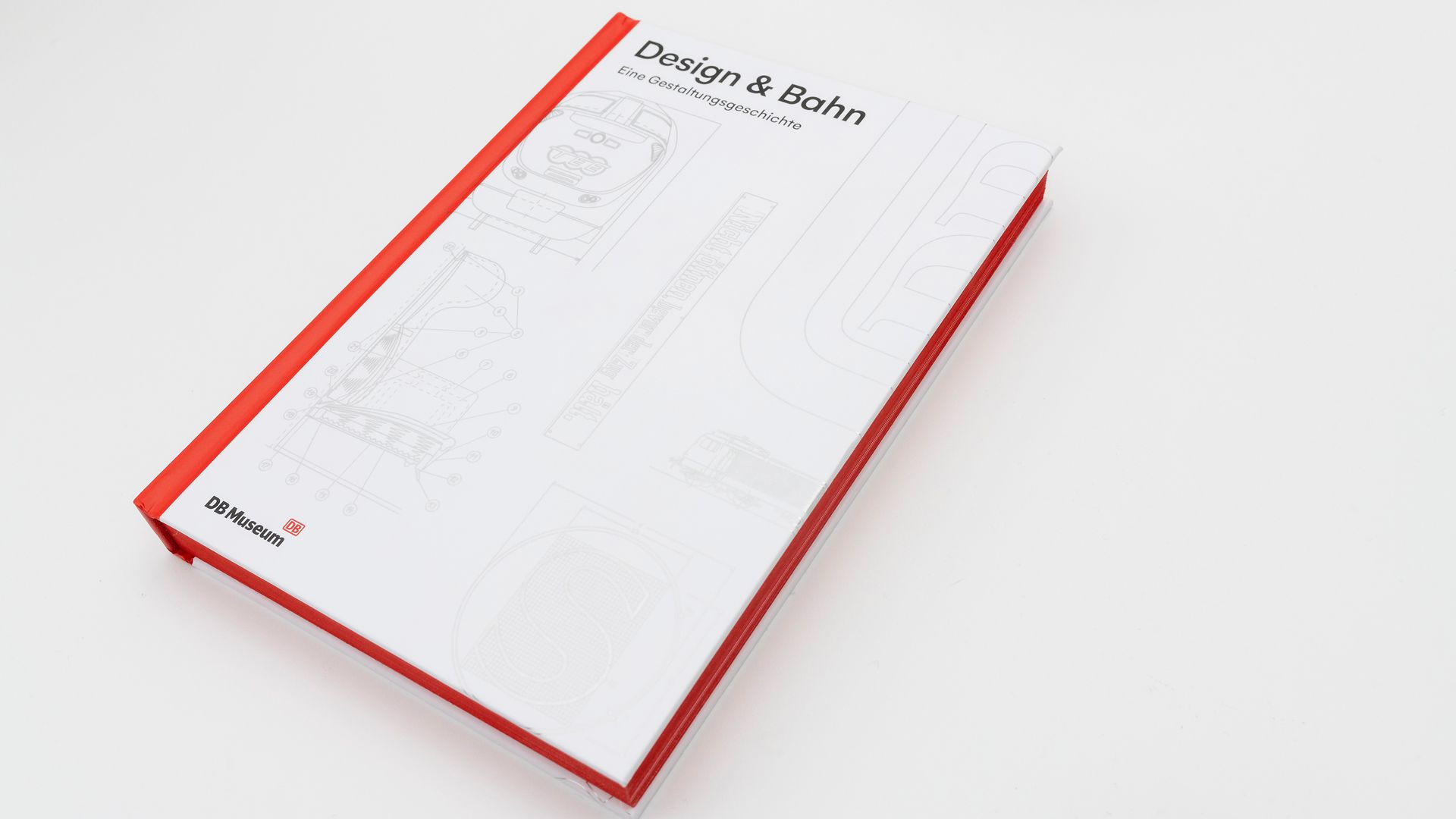 Papier auf dem "Design und Bahn" steht